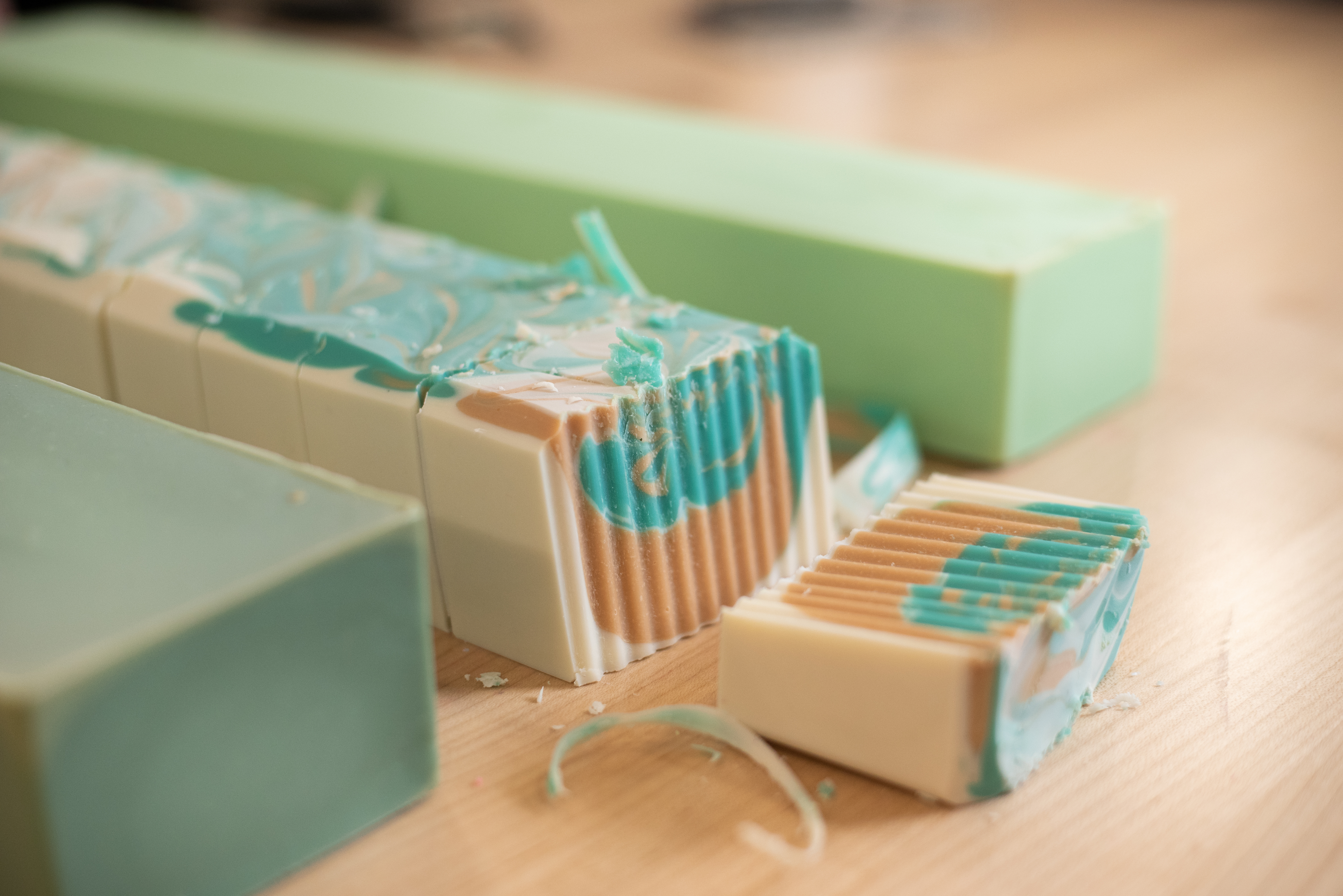 Handmade soap loaf with one bar cut off